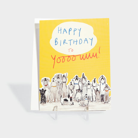 Greeting card with an illustration of a pack of dogs howling.