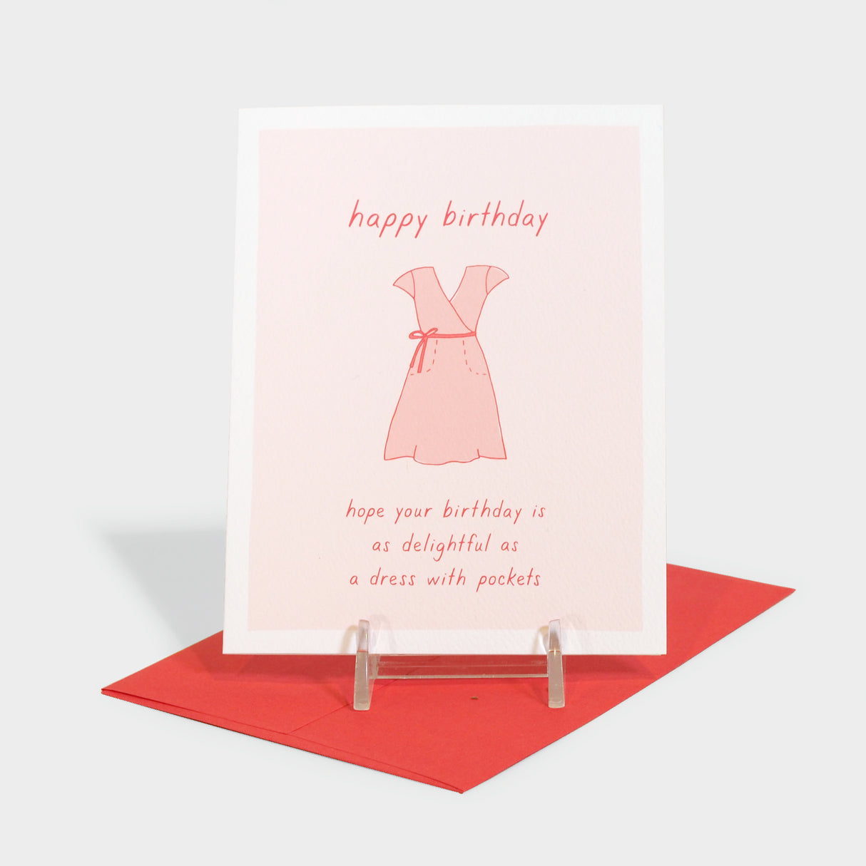 Greeting card with illustrated dress motif.