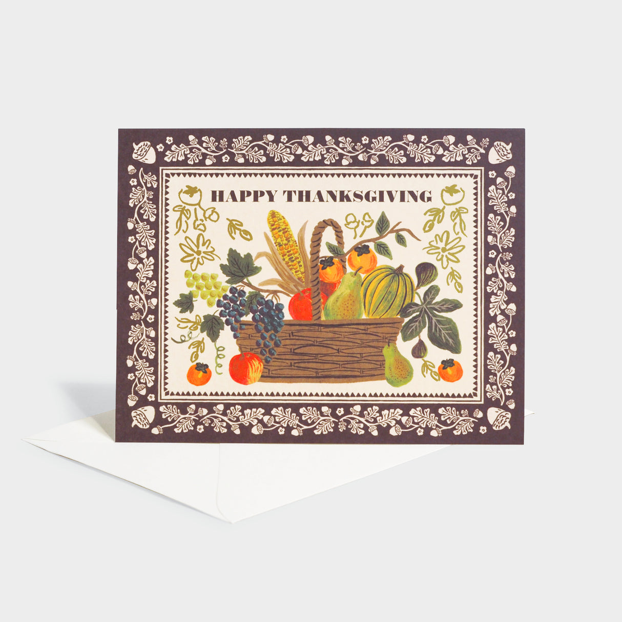 Greeting card with illustration of a Thanksgiving harvest basket.