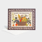Greeting card with illustration of a Thanksgiving harvest basket.