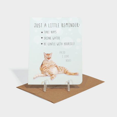 Greeting card with image of a sleeping orange tabby cat.