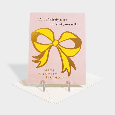 Greeting card with ribbon bow motif.