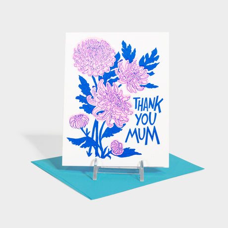 Greeting card with risograph printed illustration of mums.