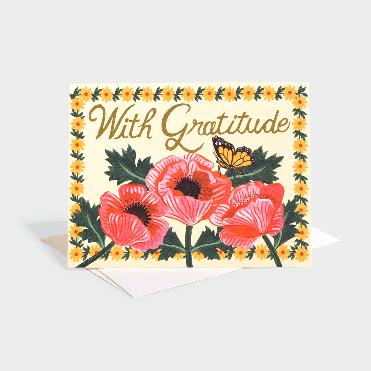 Greeting card with floral/poppy illustrations and foil stamped text.